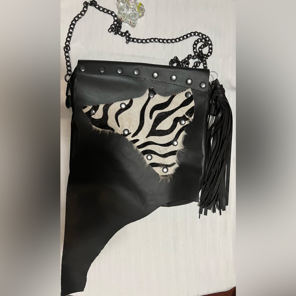 Artisan-made crossbody purse with fringe tassel by Big & Purty Custom Clutches.